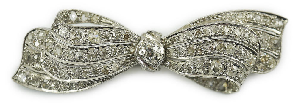 A 1940's platinum? and diamond cluster set ribbon bow brooch